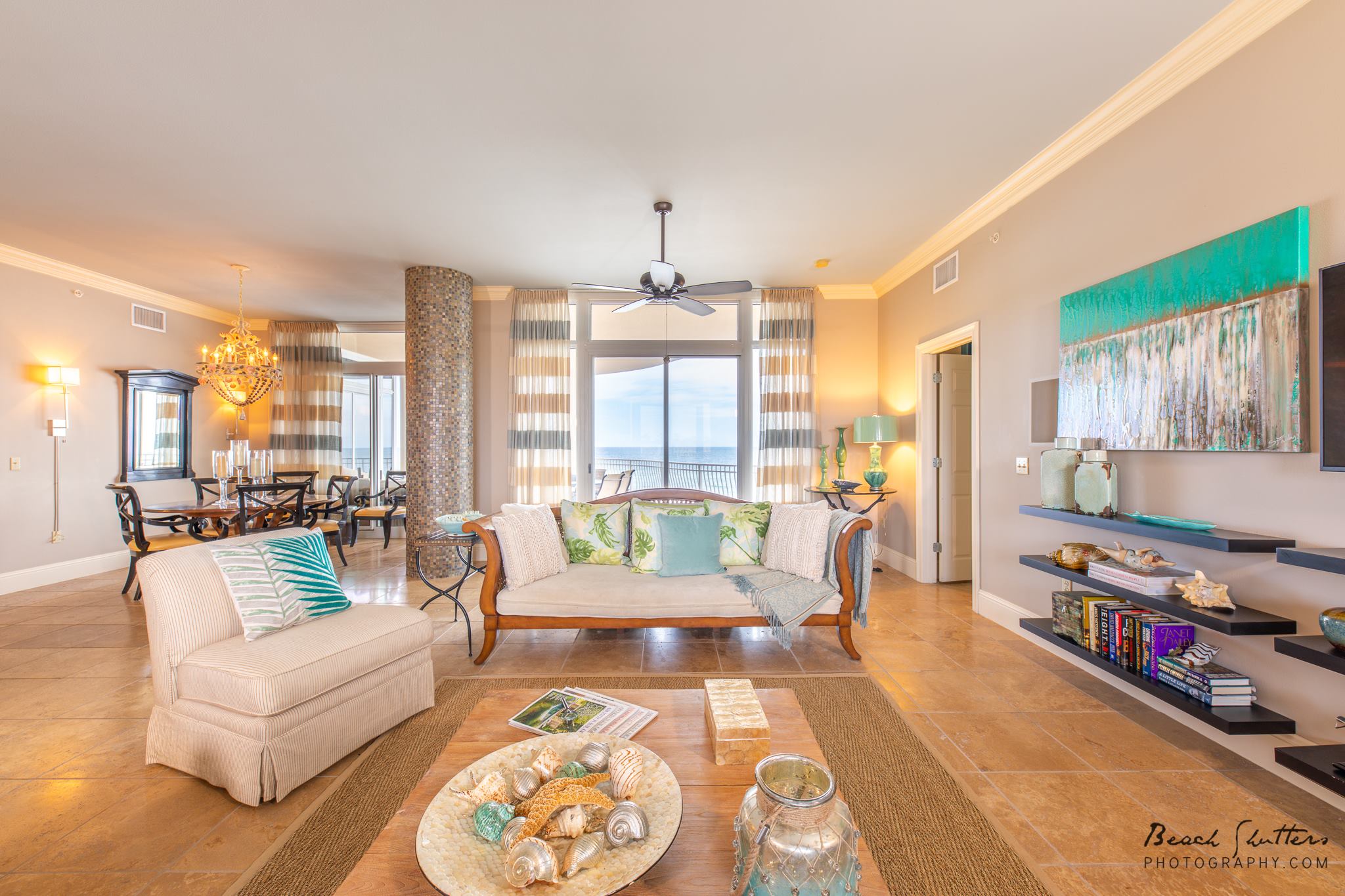 A view of the Coffee Table with the beach in the Background staged for real estate photography