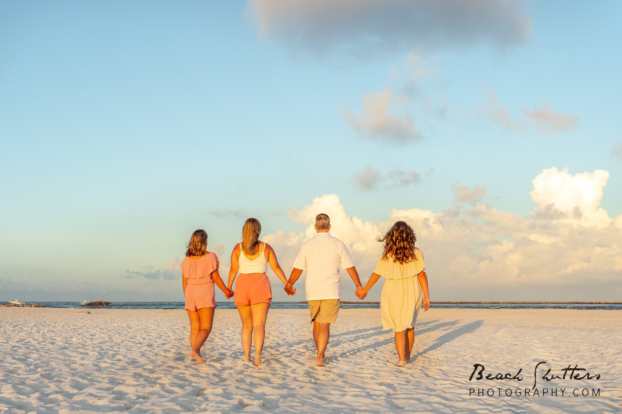 family photography at the rocks in Orange Beach