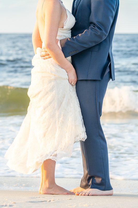 Wedding photos of a couple on the beach near the gulf